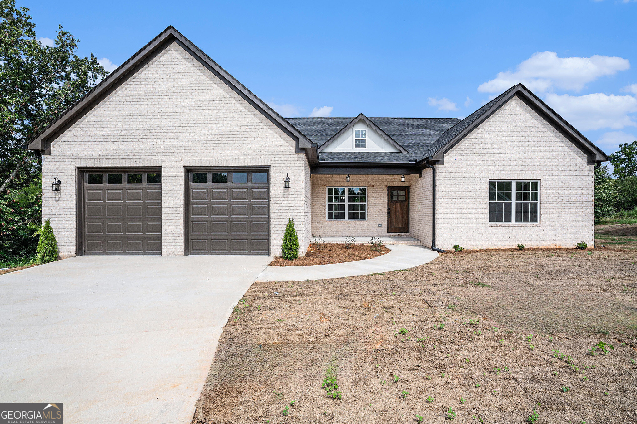 a view of outdoor space yard and front view of a house