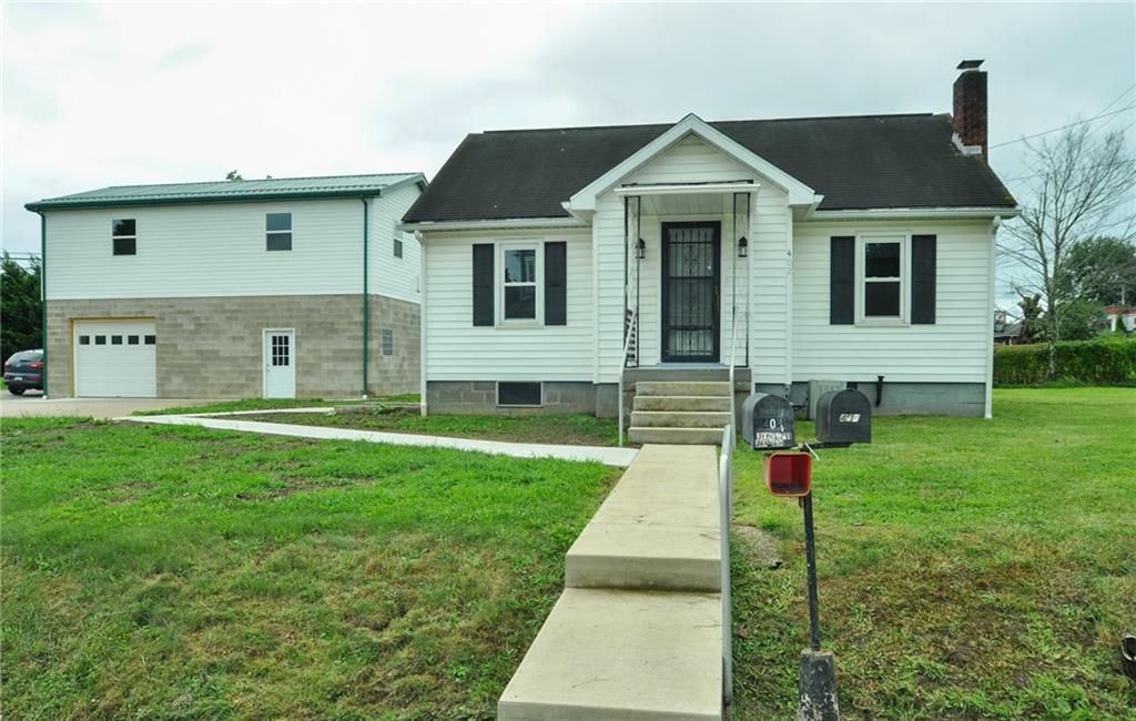 a front view of house with yard