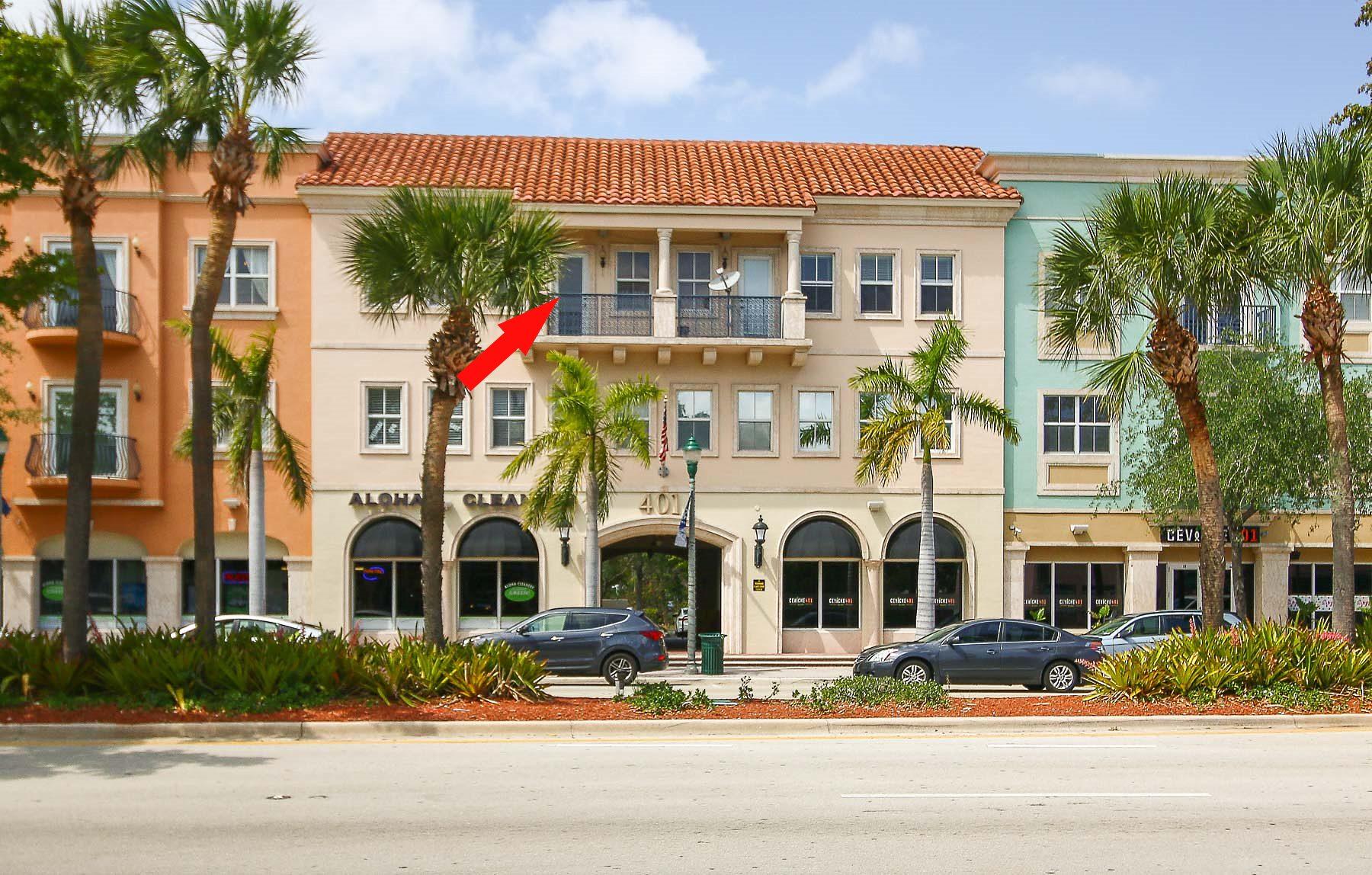 a front view of building with street view