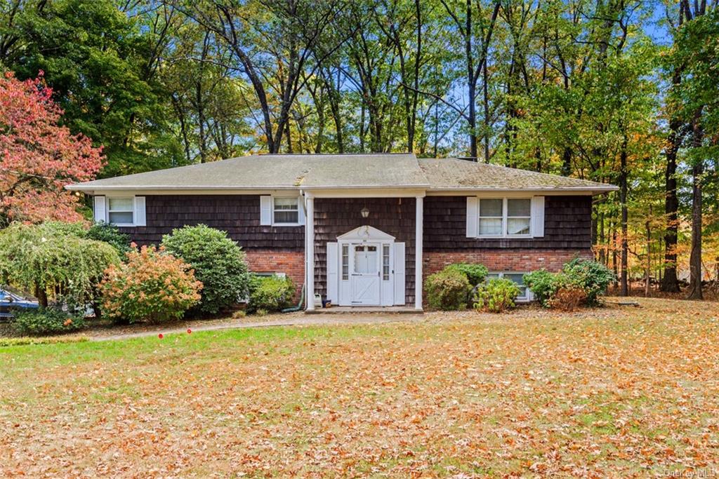 View of front of home with a front yard