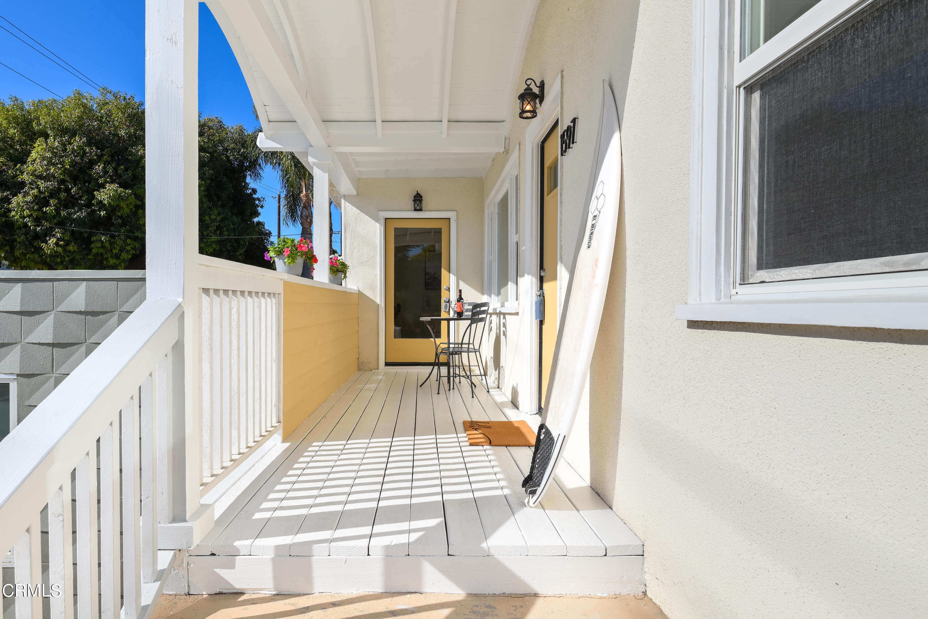 a view of balcony with furniture