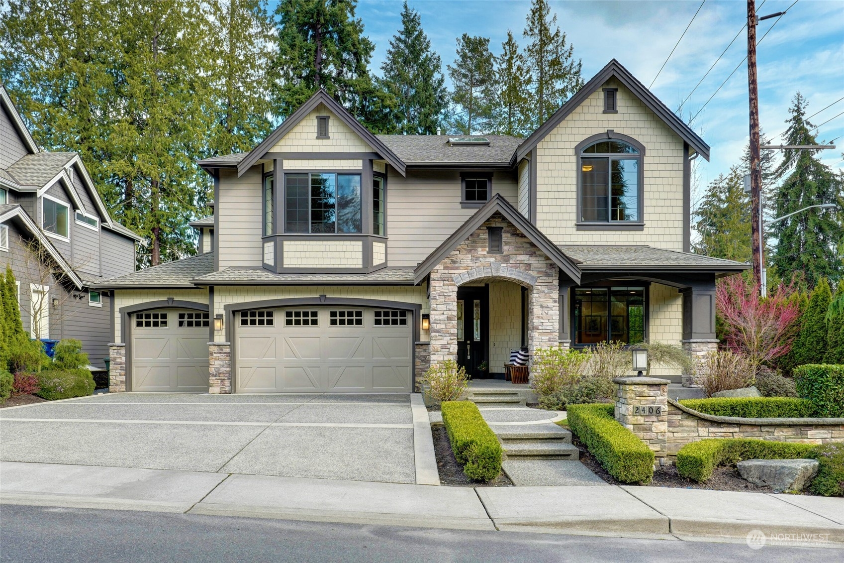 a front view of a house with garden