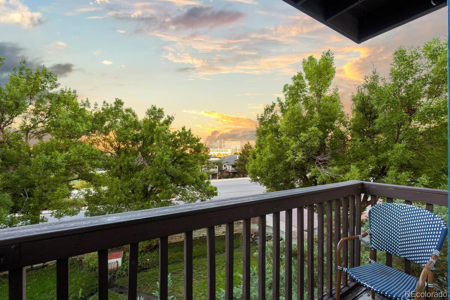 a view of balcony with wooden floor and outdoor space