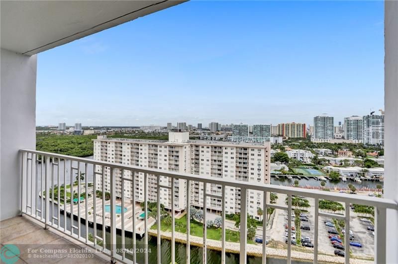 a view of city from a balcony