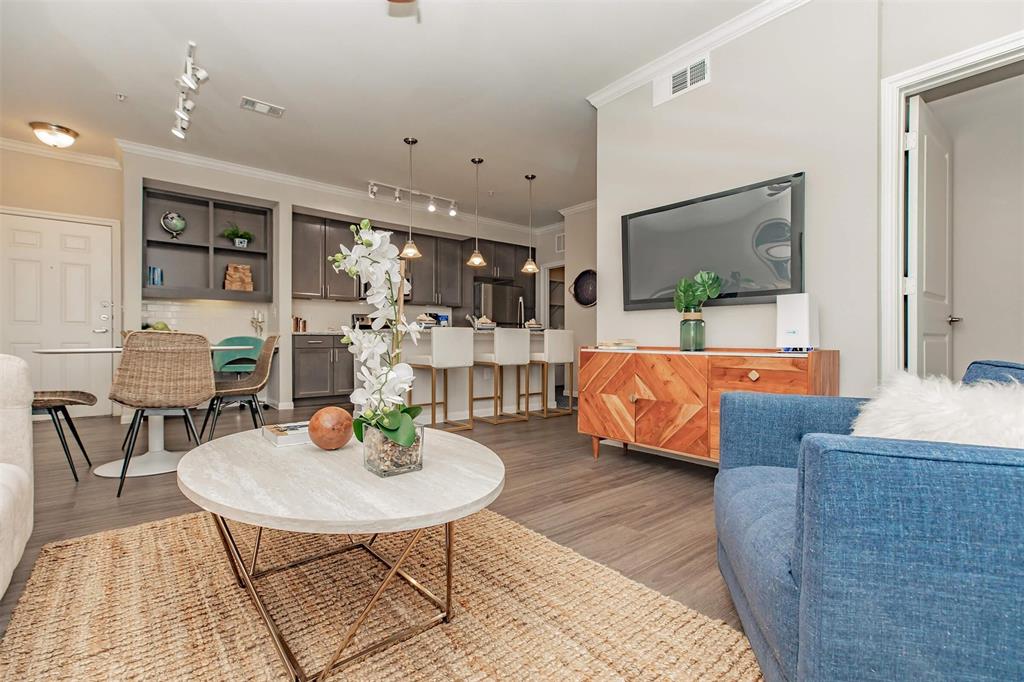 a living room with furniture and a table