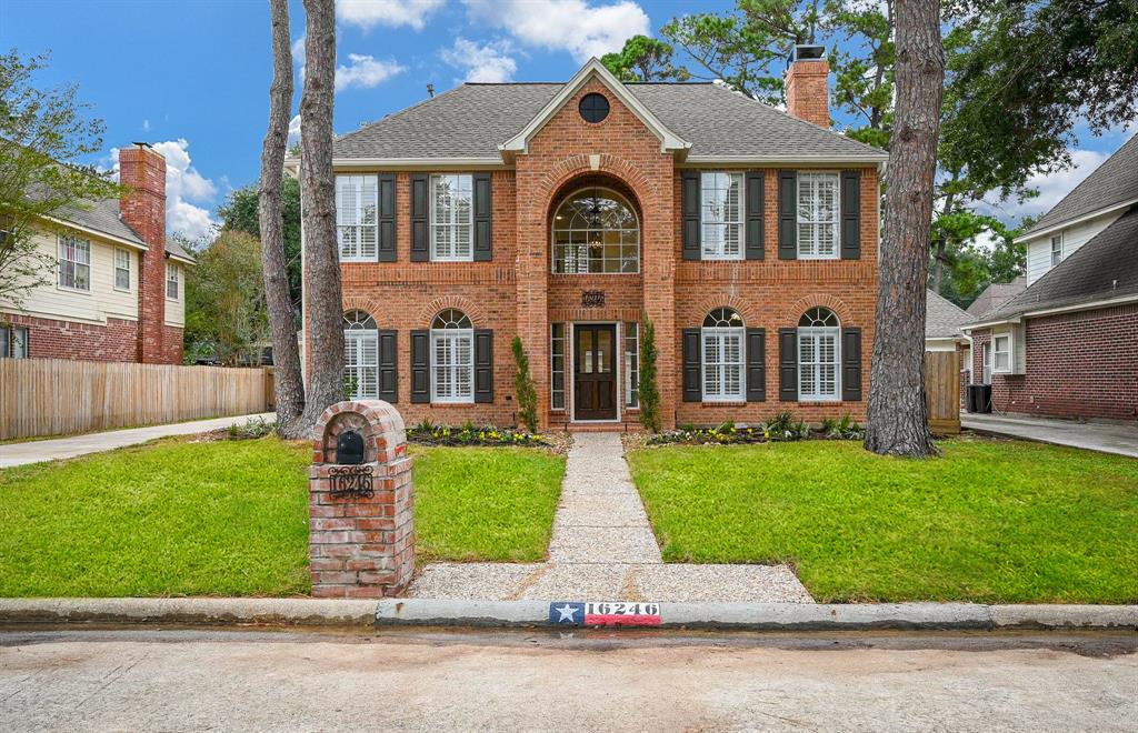 front view of house with a yard