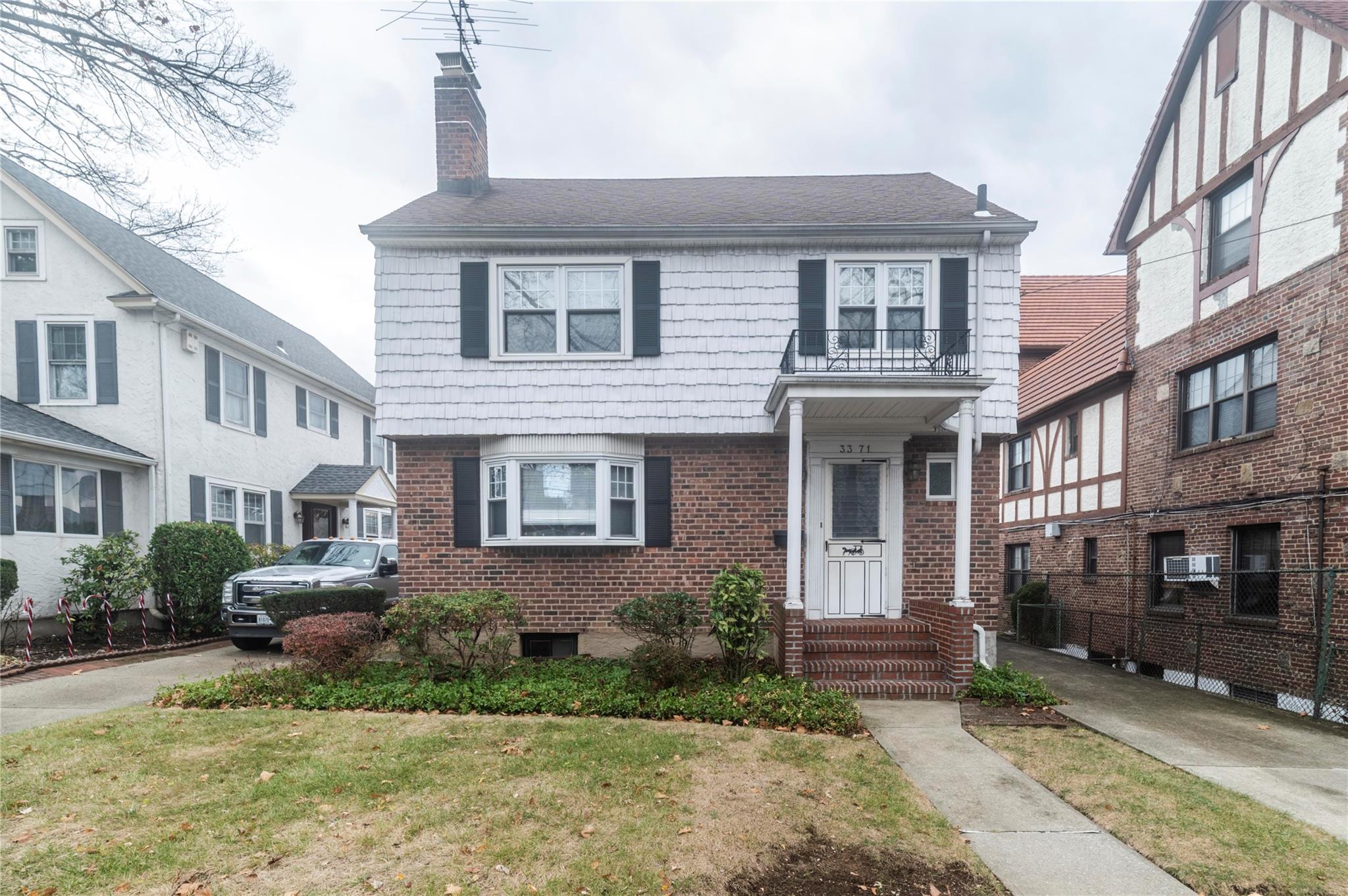 View of front of home featuring a front lawn