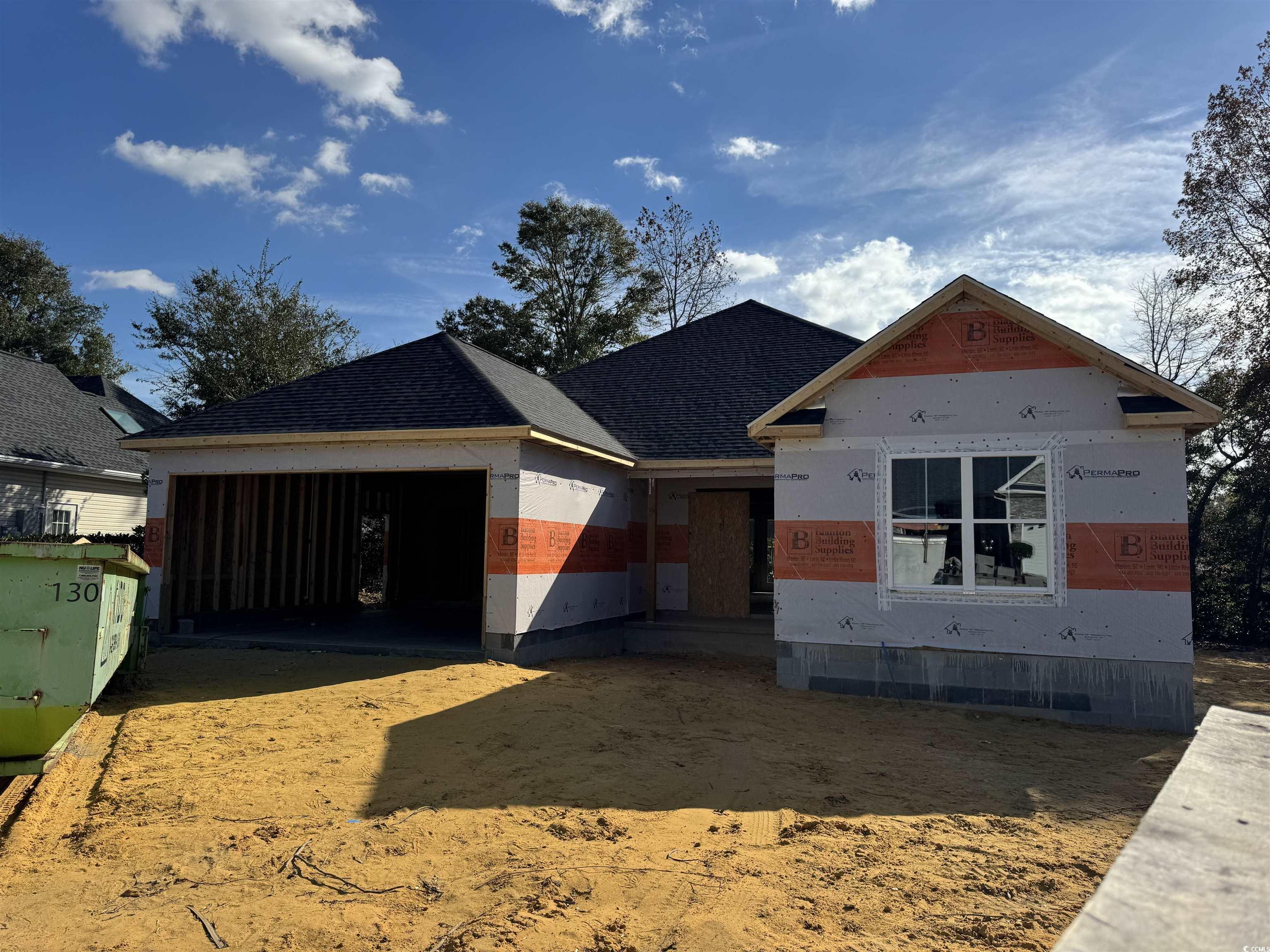 Unfinished property with a garage