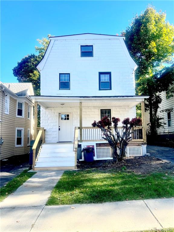 View of front of property featuring a porch