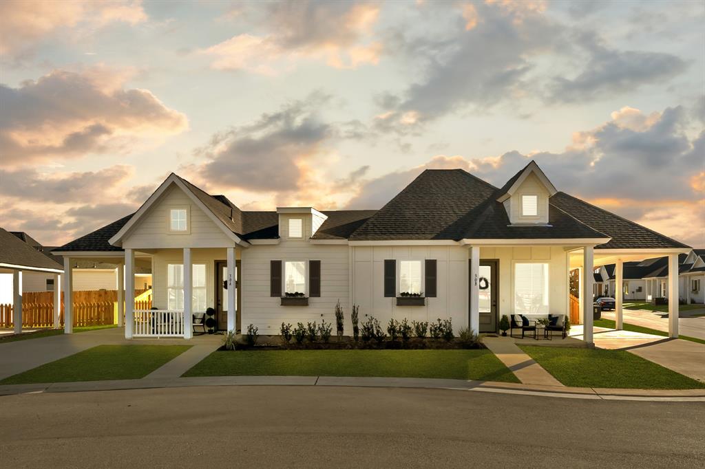 front view of a house with a yard