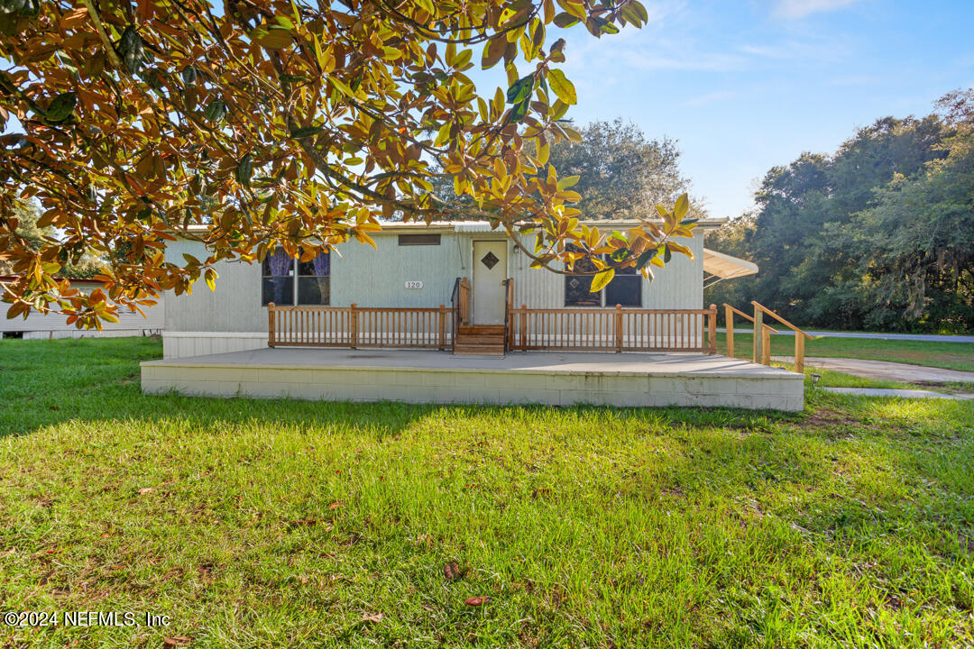 a house view with a garden space