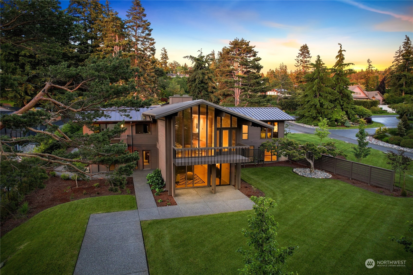 a view of a house with a yard porch and sitting area