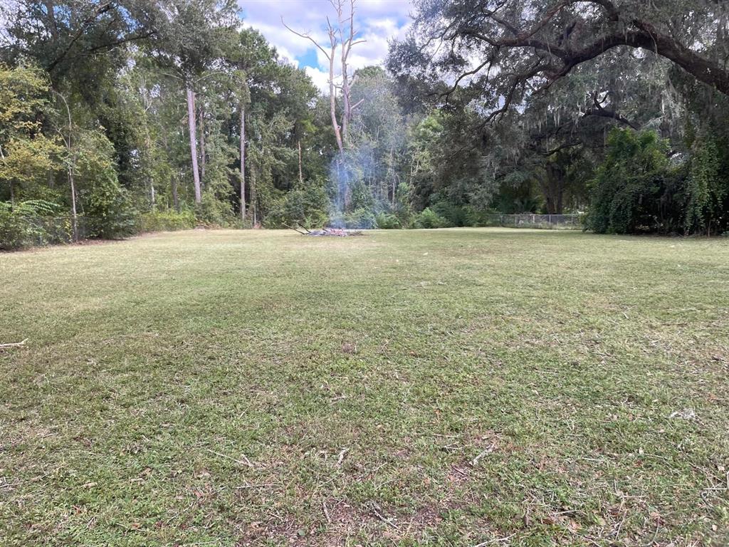 a view of outdoor space and yard