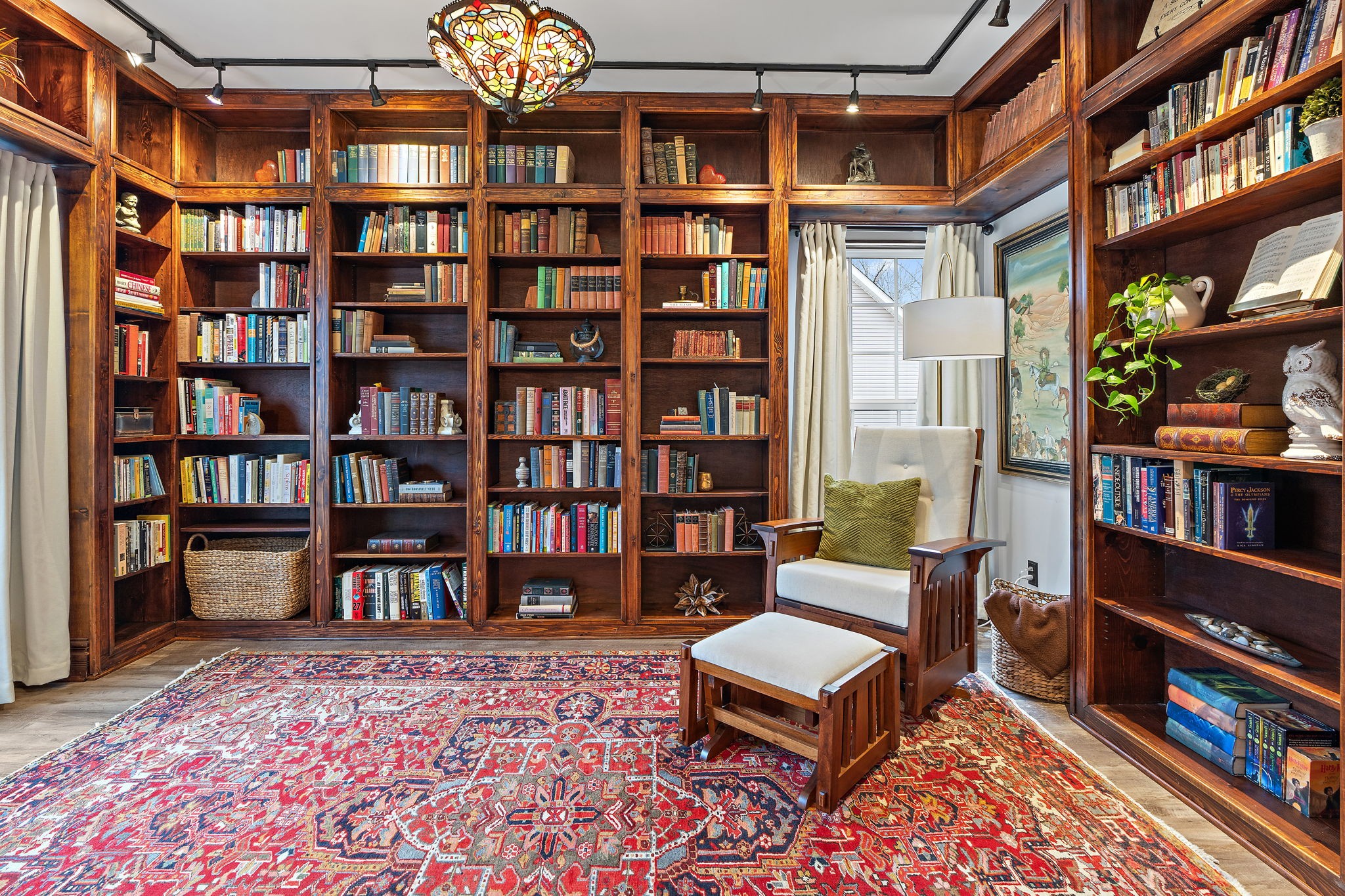 Stunning library off the front foyer with French doors. Perfect for an office.