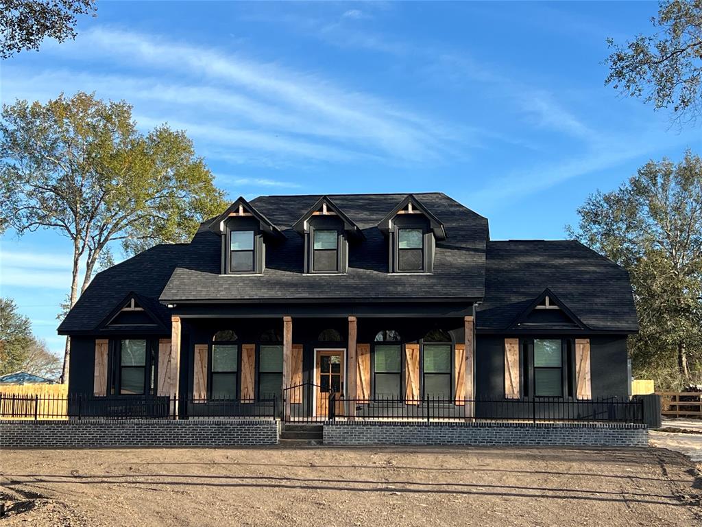 front view of a house with a balcony