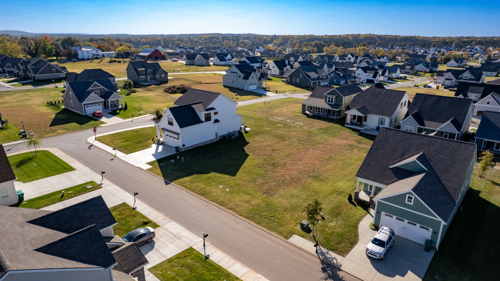 an aerial view of a house with a garden