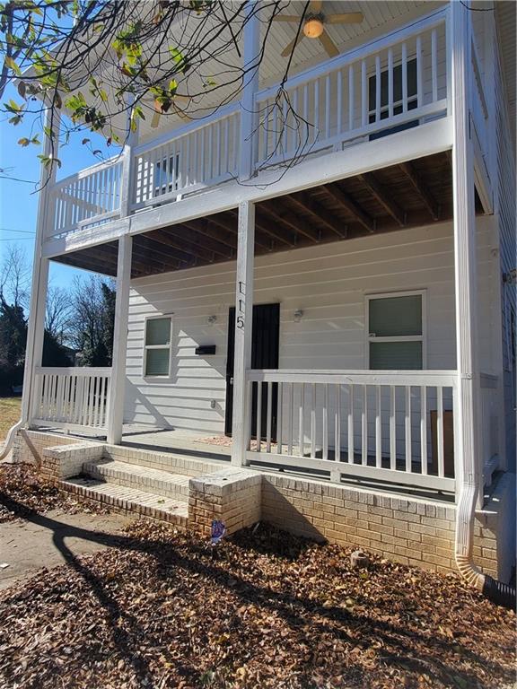 a front view of a house with a balcony