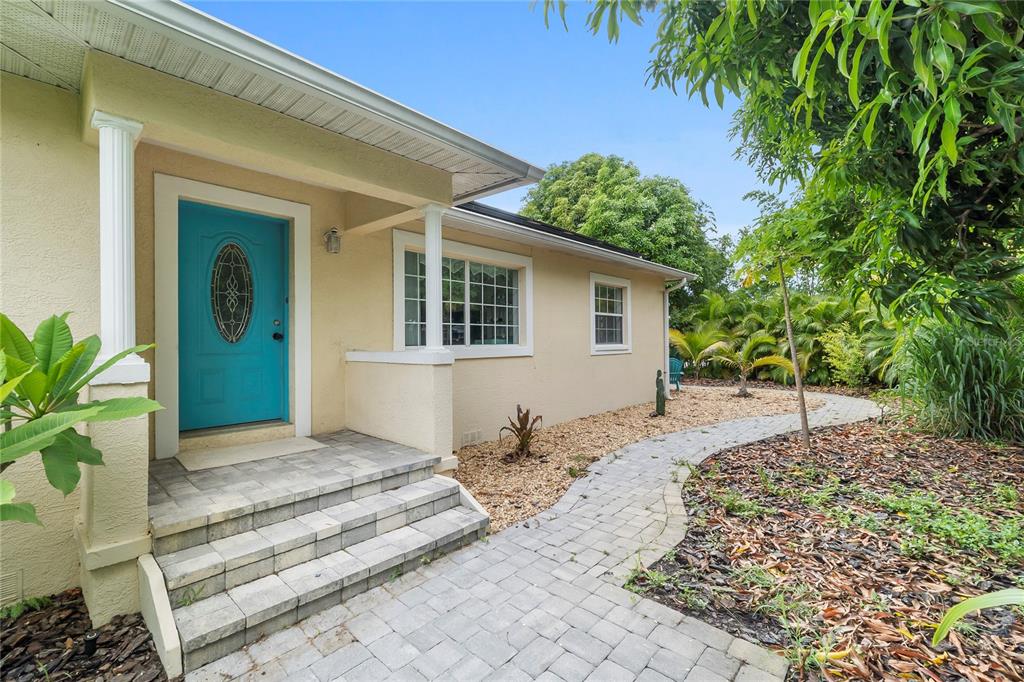 a house with trees in front of it