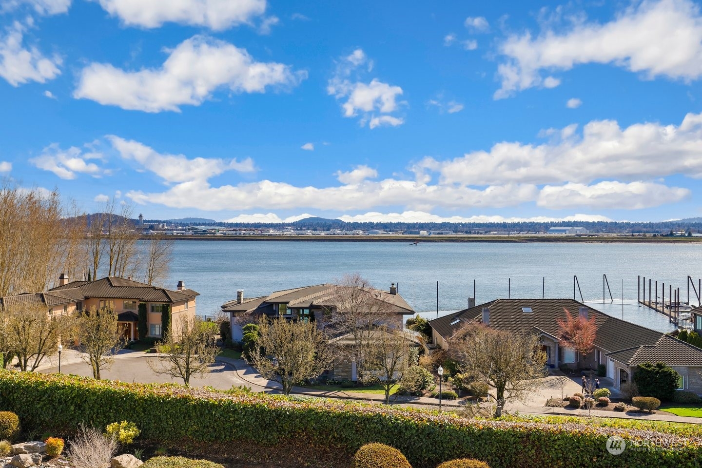 a view of a lake with houses and lake view