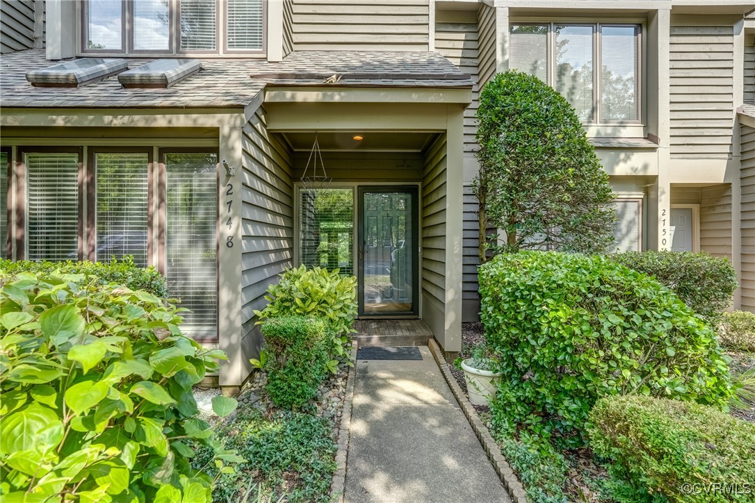 a view of a entryway door front of house