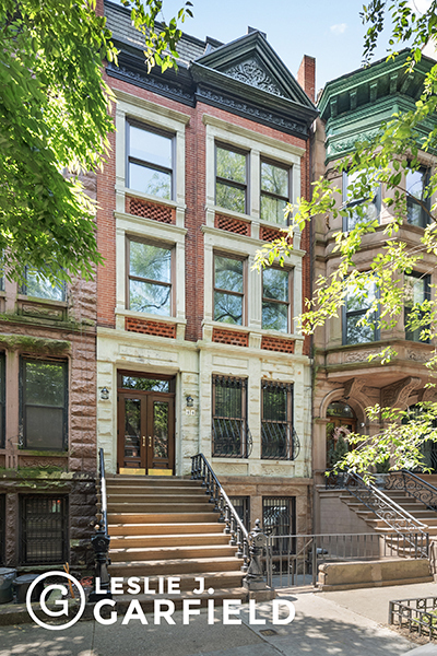 a front view of a house with windows