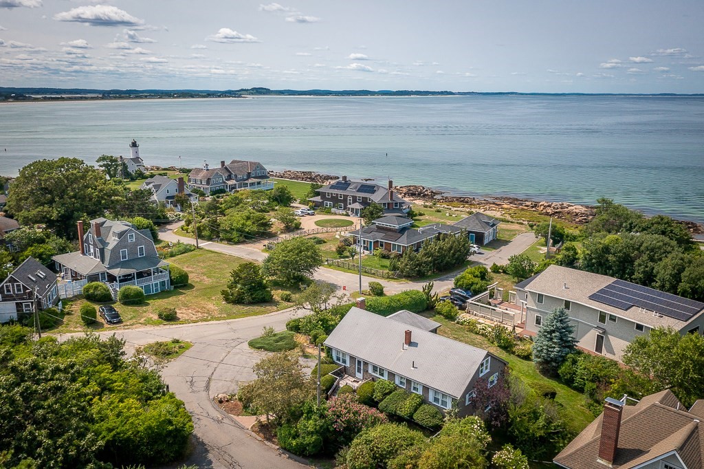 an aerial view of a house with outdoor space