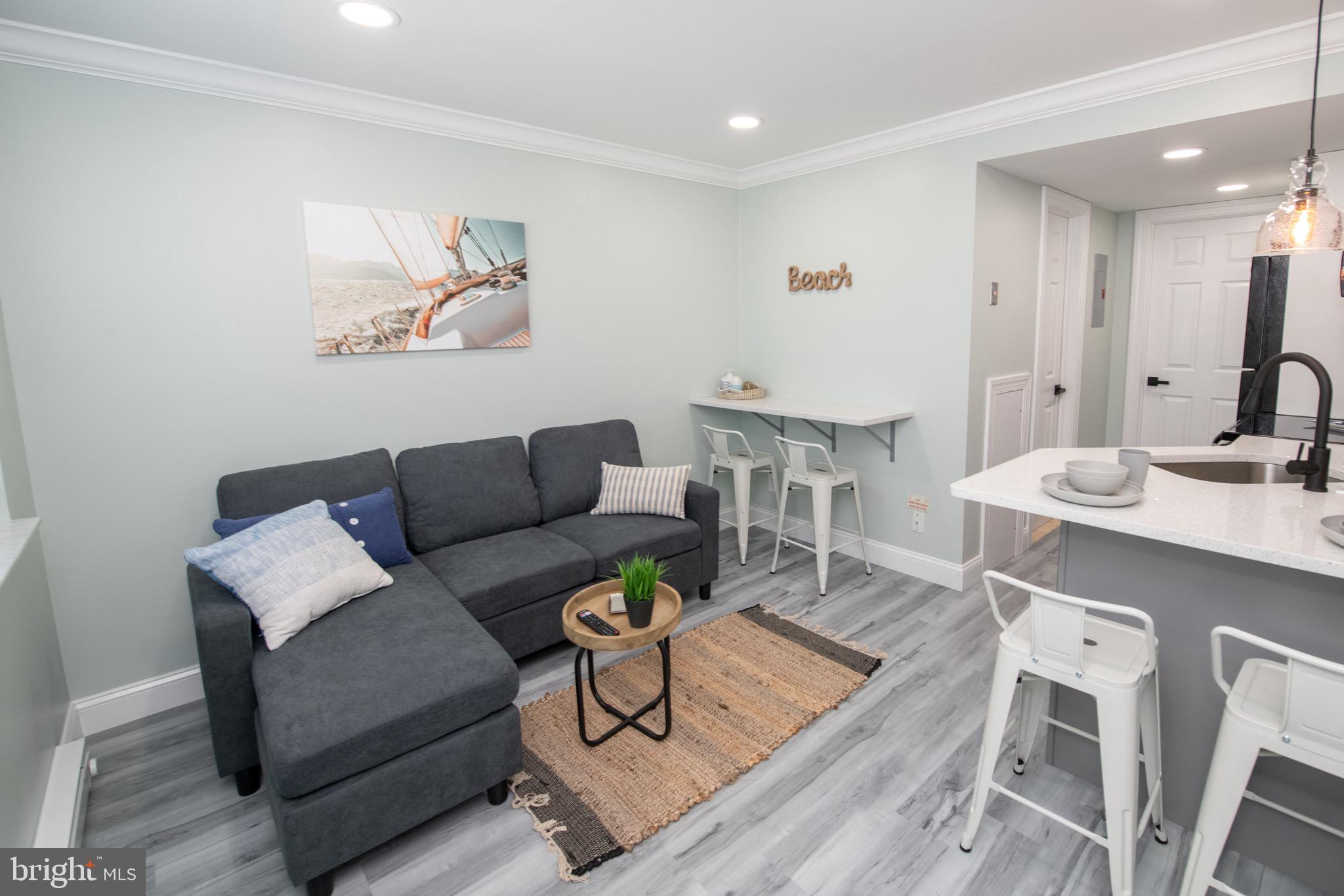 a living room with furniture and a table