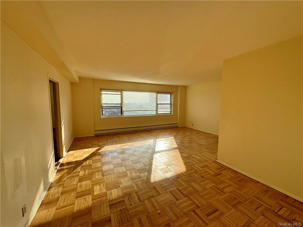 a view of an empty room and window