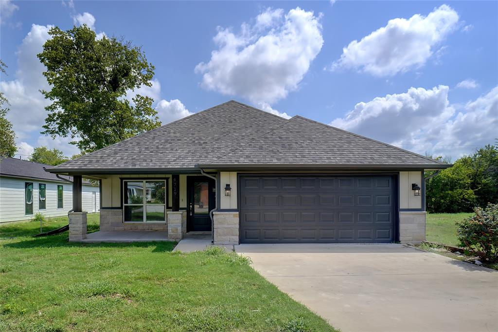 a front view of house with yard