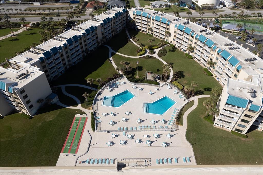 an aerial view of a swimming pool