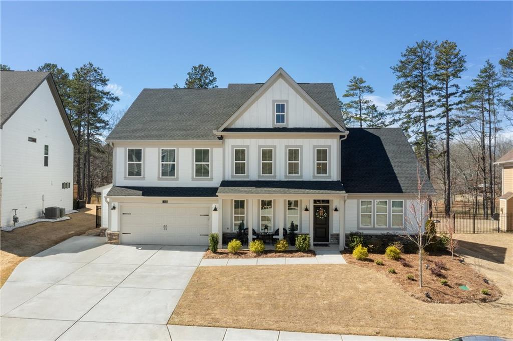 a front view of a house with a yard