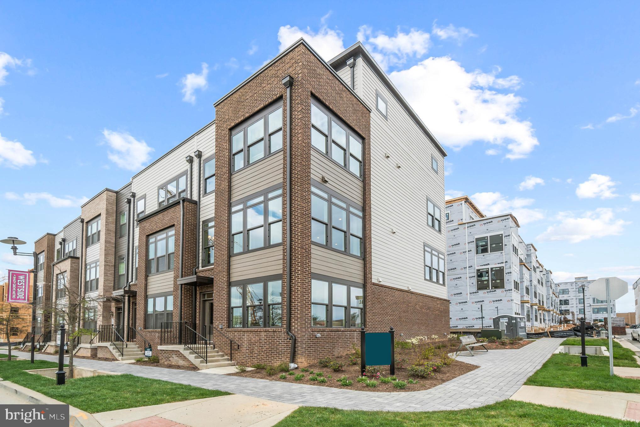 a view of a building with a yard