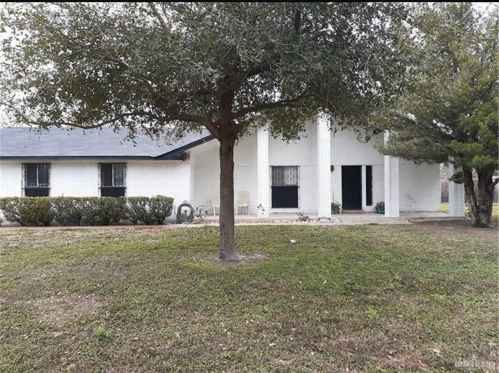 a front view of house with yard