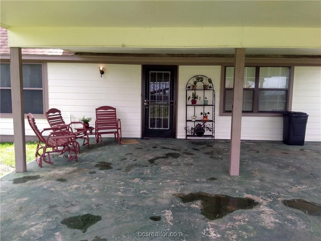 a view of a chairs in front of house