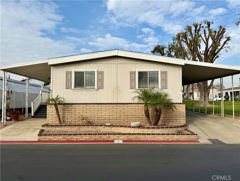 a front view of a house with garage