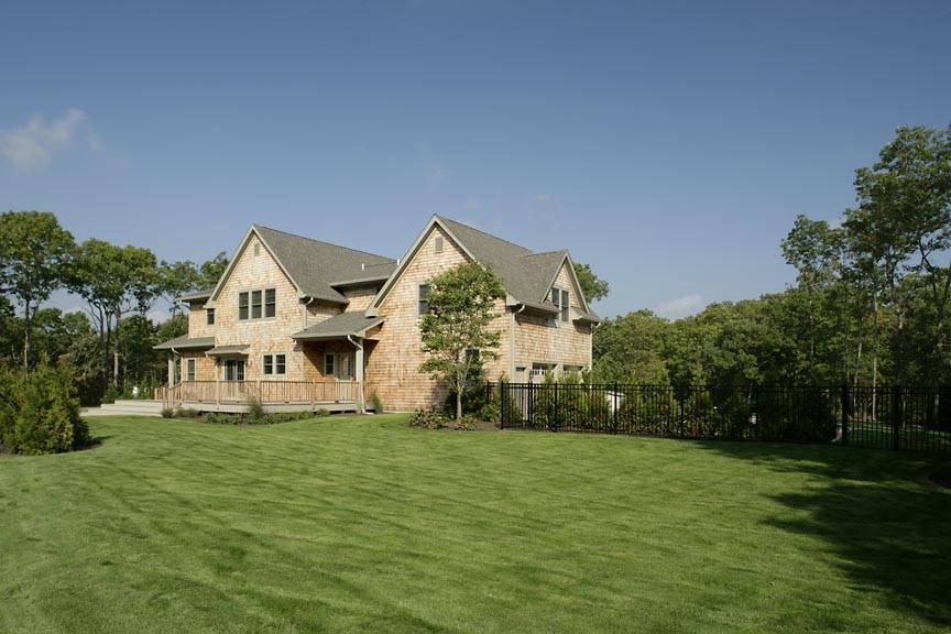 a view of a house with a big yard