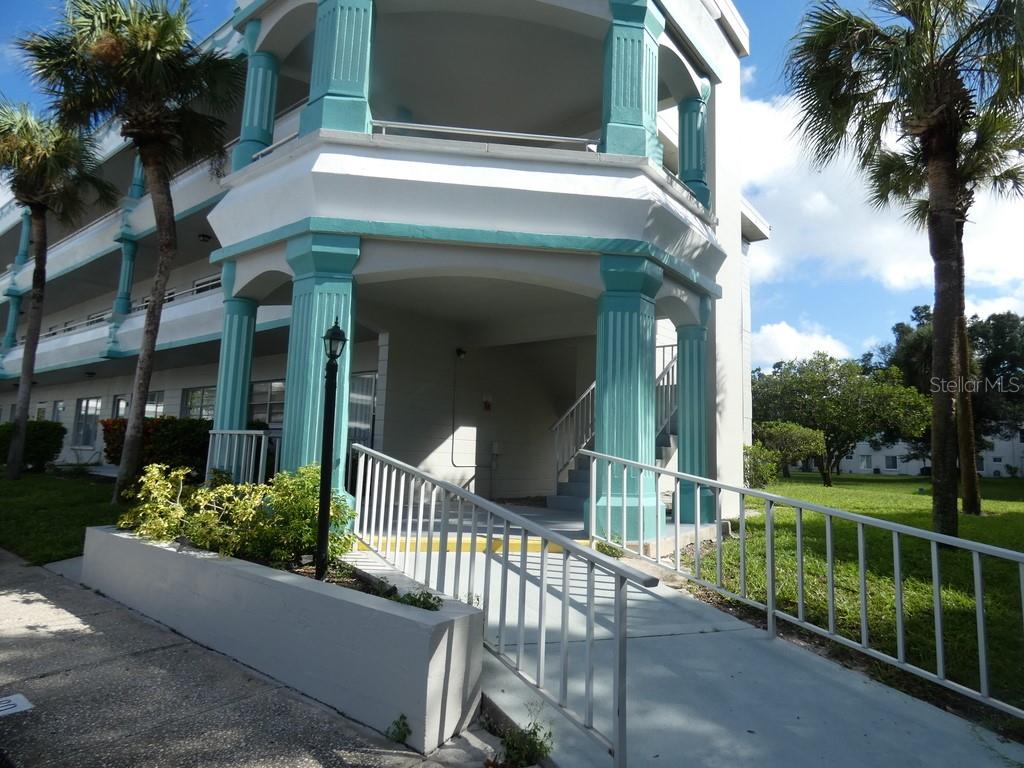 front view of a house with a garden