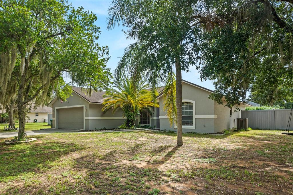 a house with trees in the background