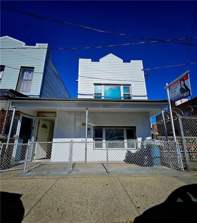 a front view of a house with parking