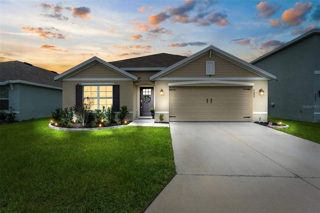 a front view of house with yard