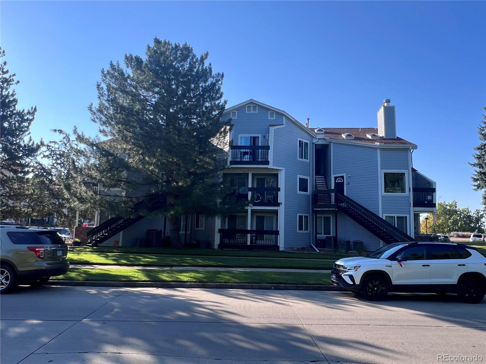 a car parked in front of a house