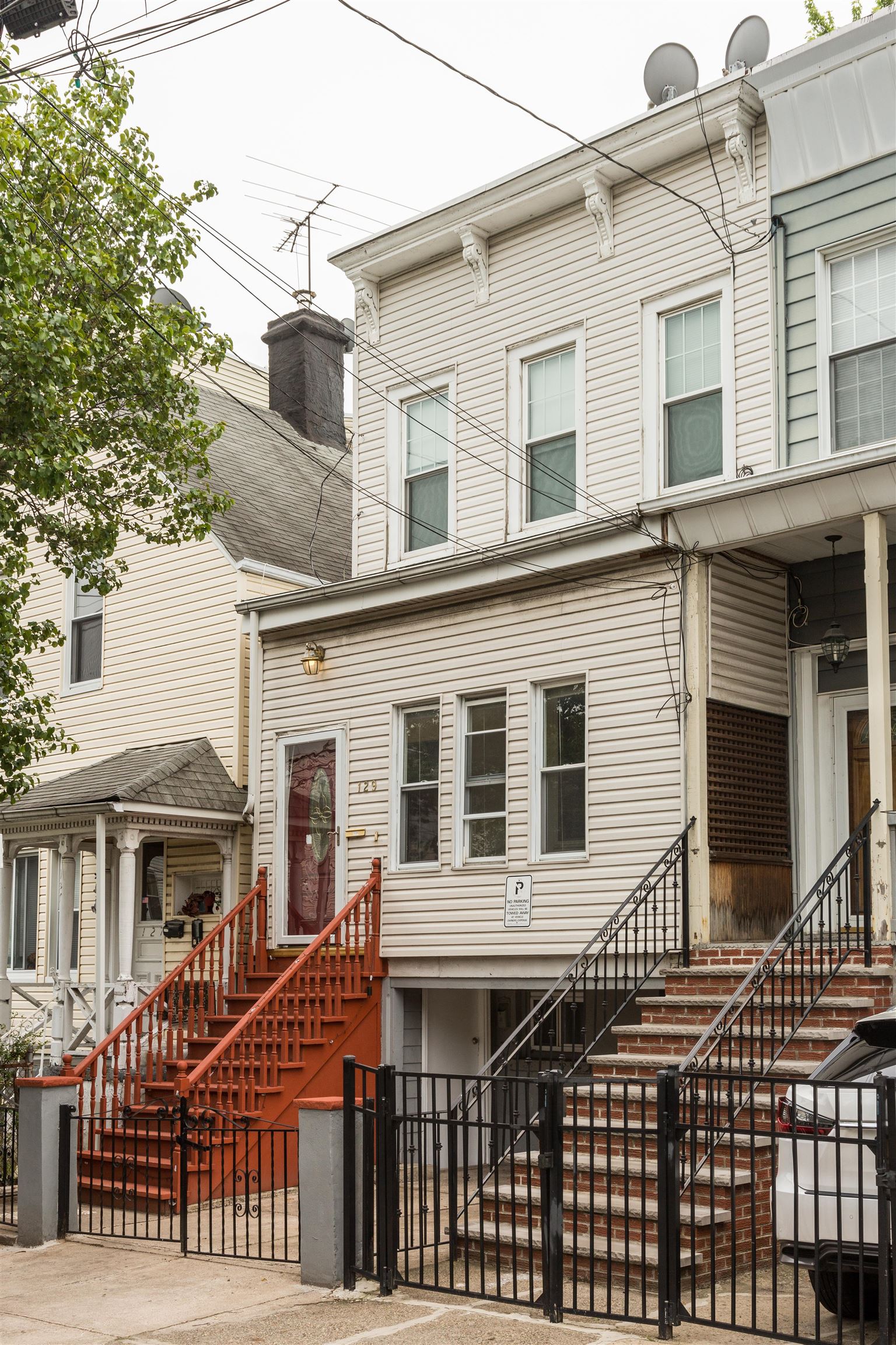 a front view of a house with a porch