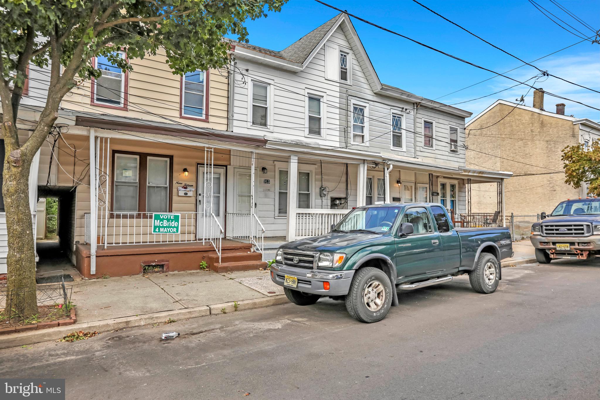 a car parked in front of a house