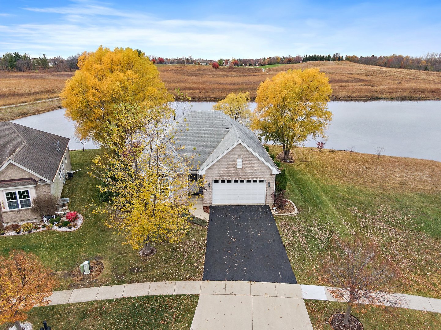 an aerial view of a house with a ocean view