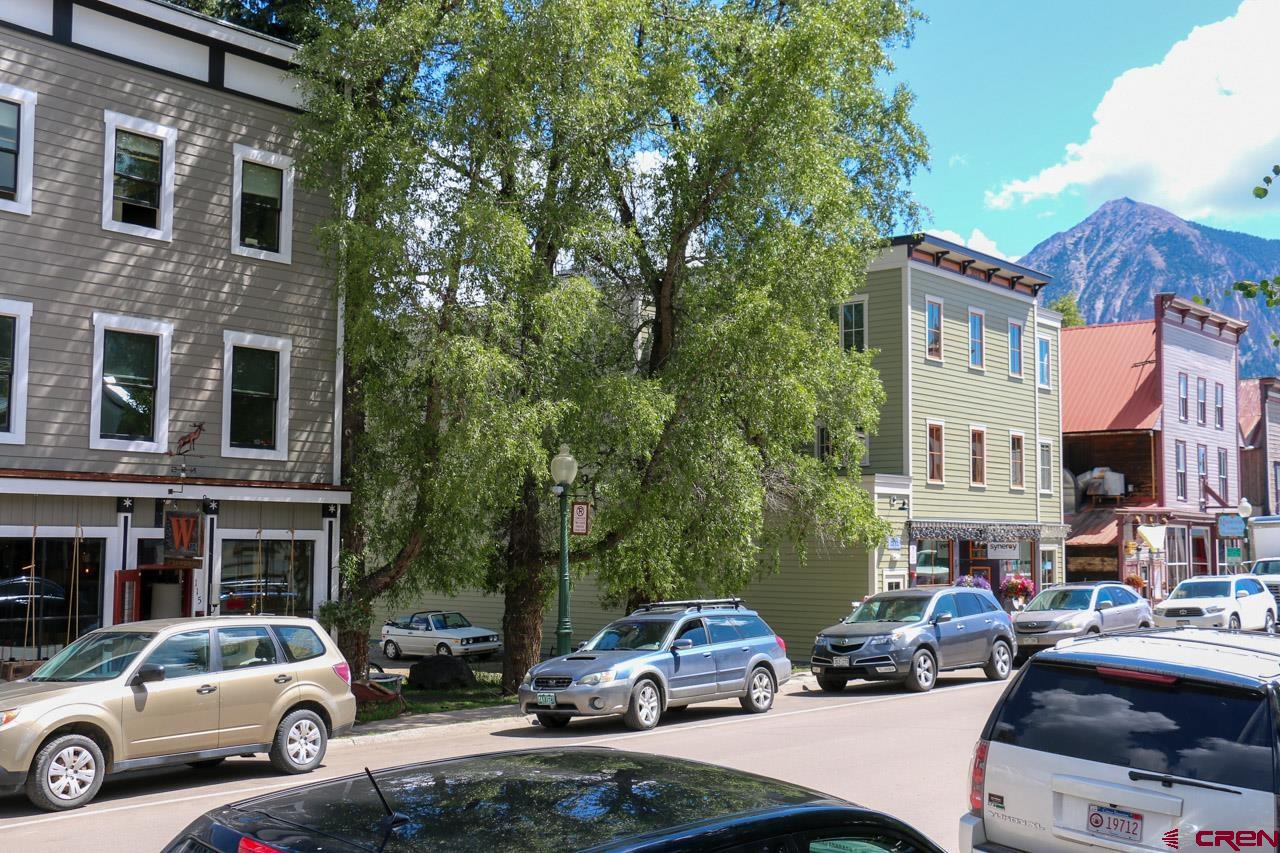 a car parked in front of a building