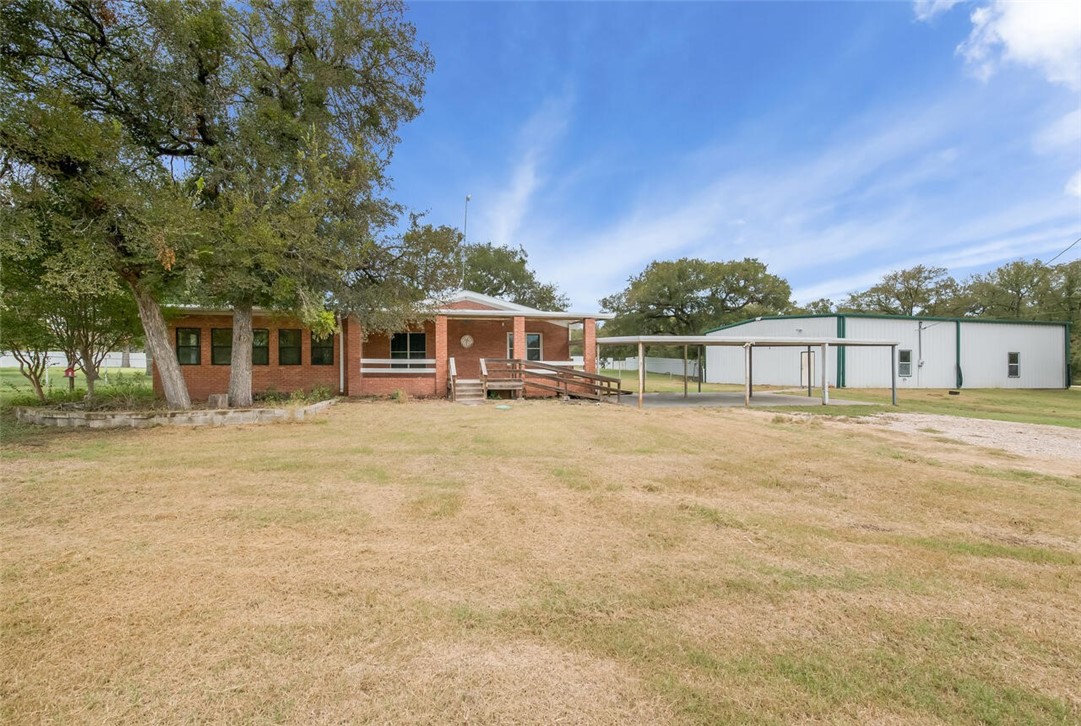 front view of a house with a swimming pool