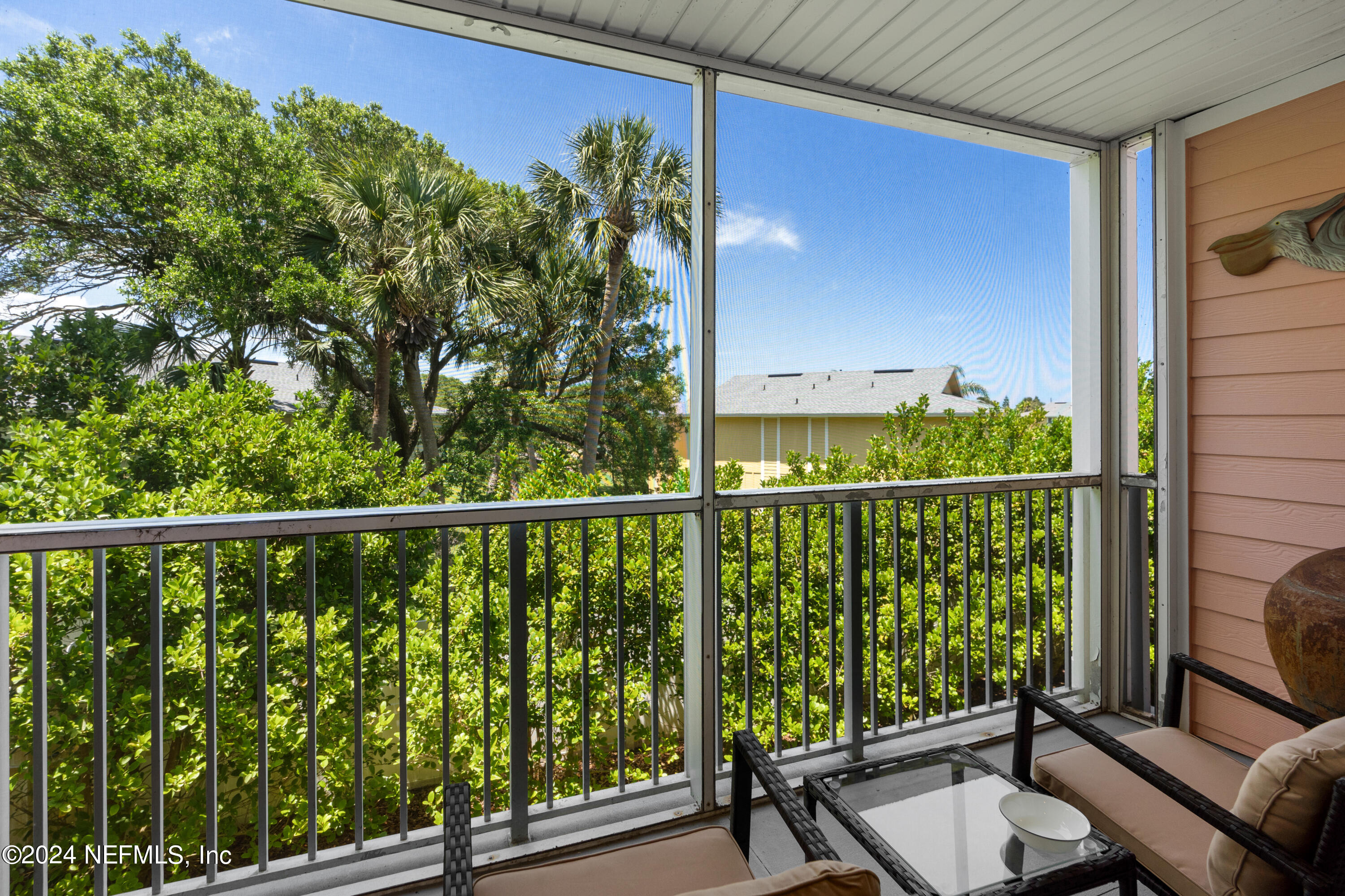 a view of balcony with furniture