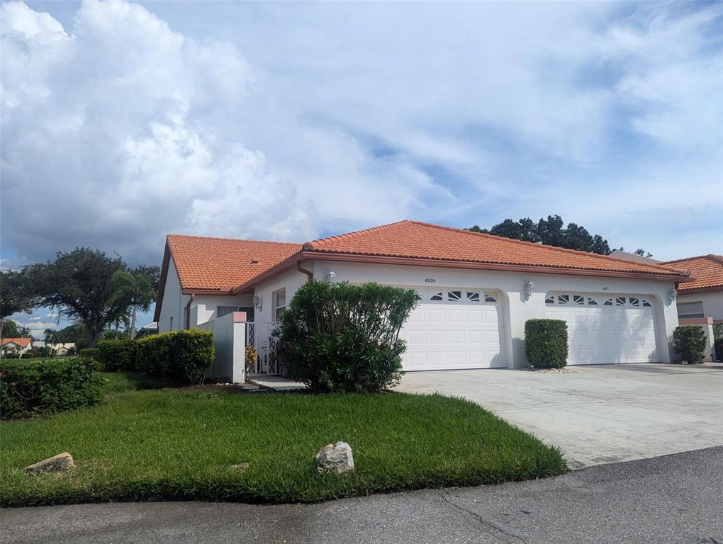 front view of a house with a yard