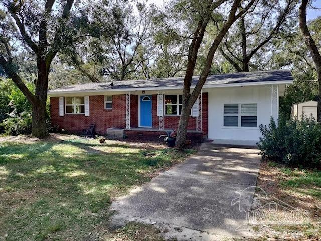 front view of a house with a yard