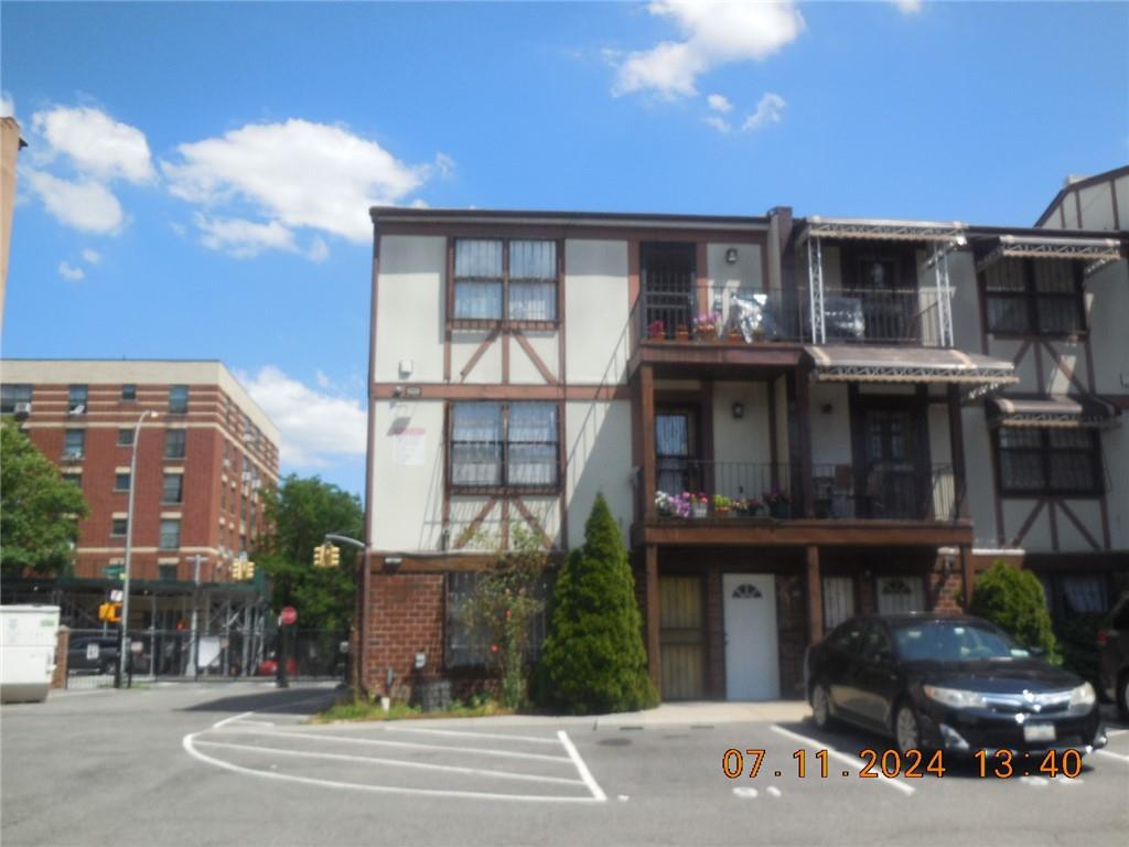 a front view of a building with street view